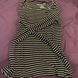 Cute winter top! The black and white pattern brings out the complexion